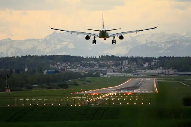 Airplane landing on an airstrip
