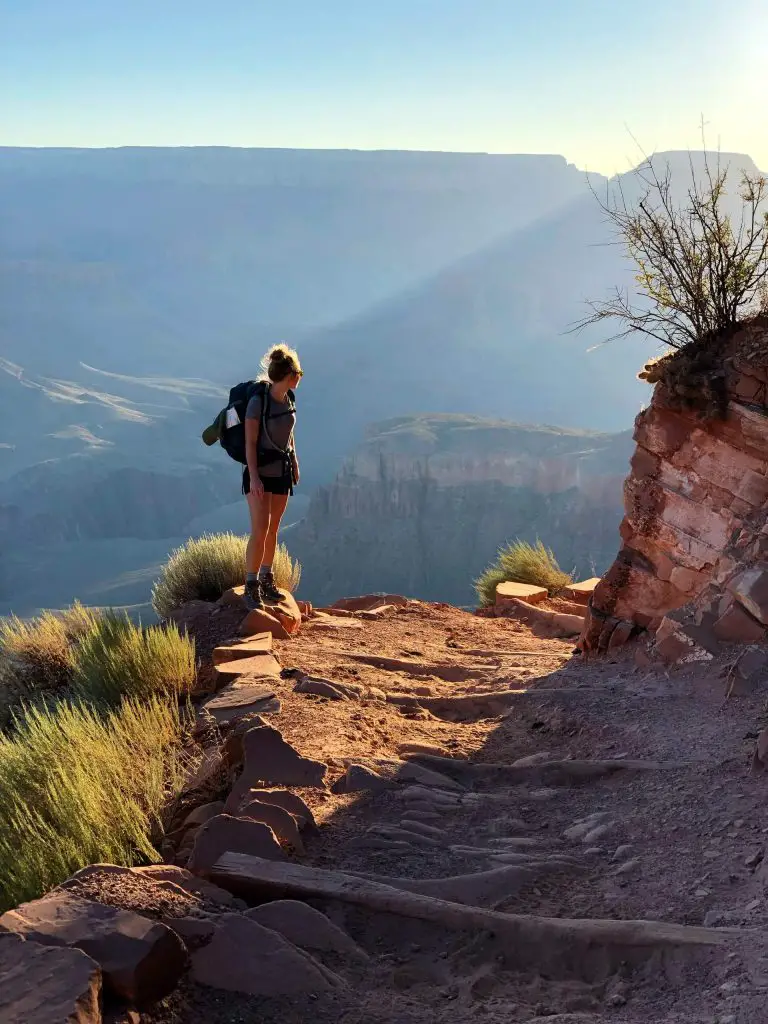 woman hiking on grand canyon trail