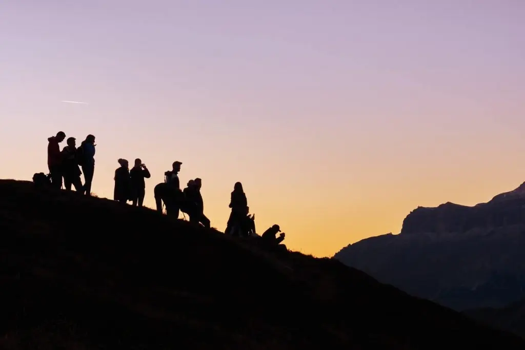 hikers at sunset