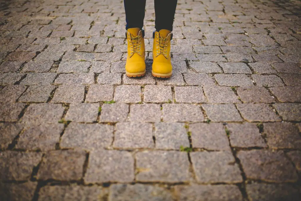 hiking boots on pavement
