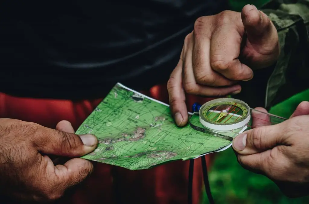 hikers using topographic map