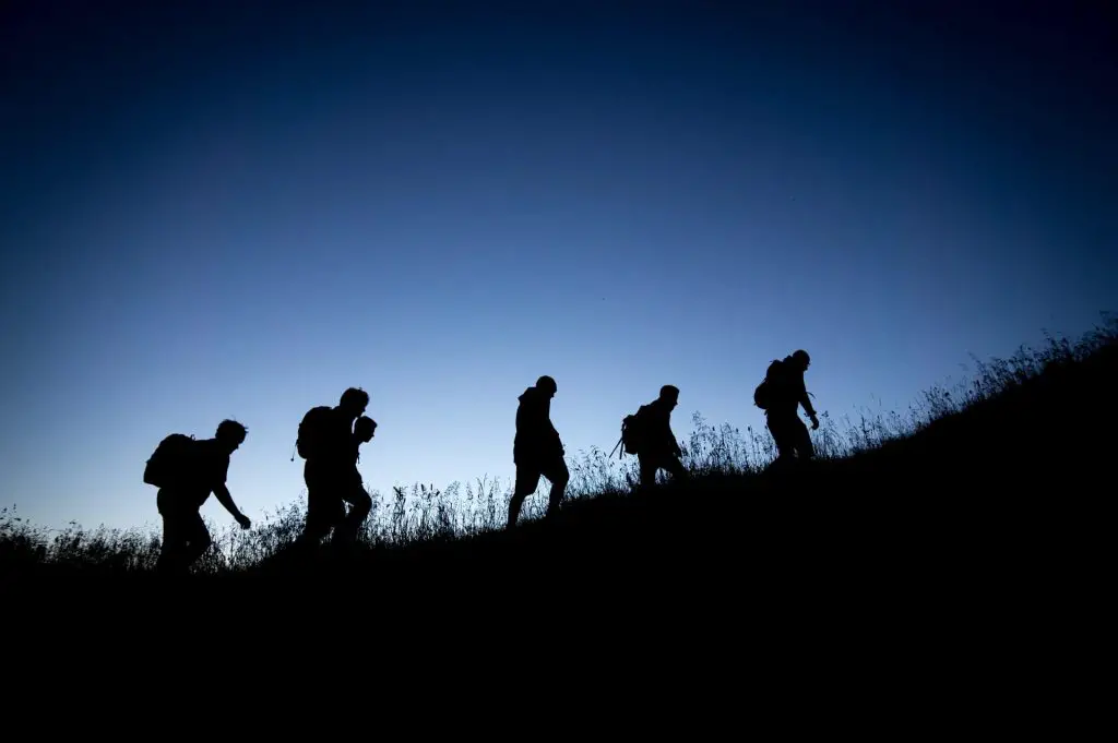 group of hikers at night