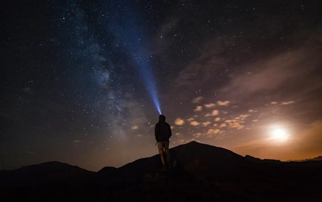 hiker with a headlamp