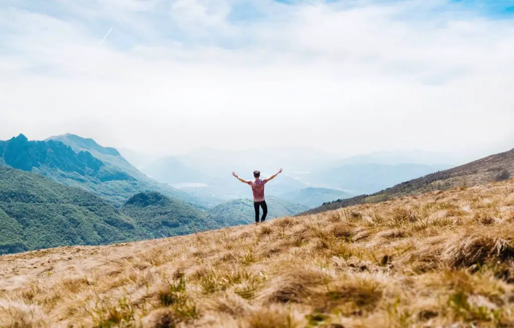 hiker in short sleeve on mountain