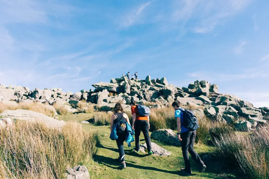 group of hikers going up a mountain