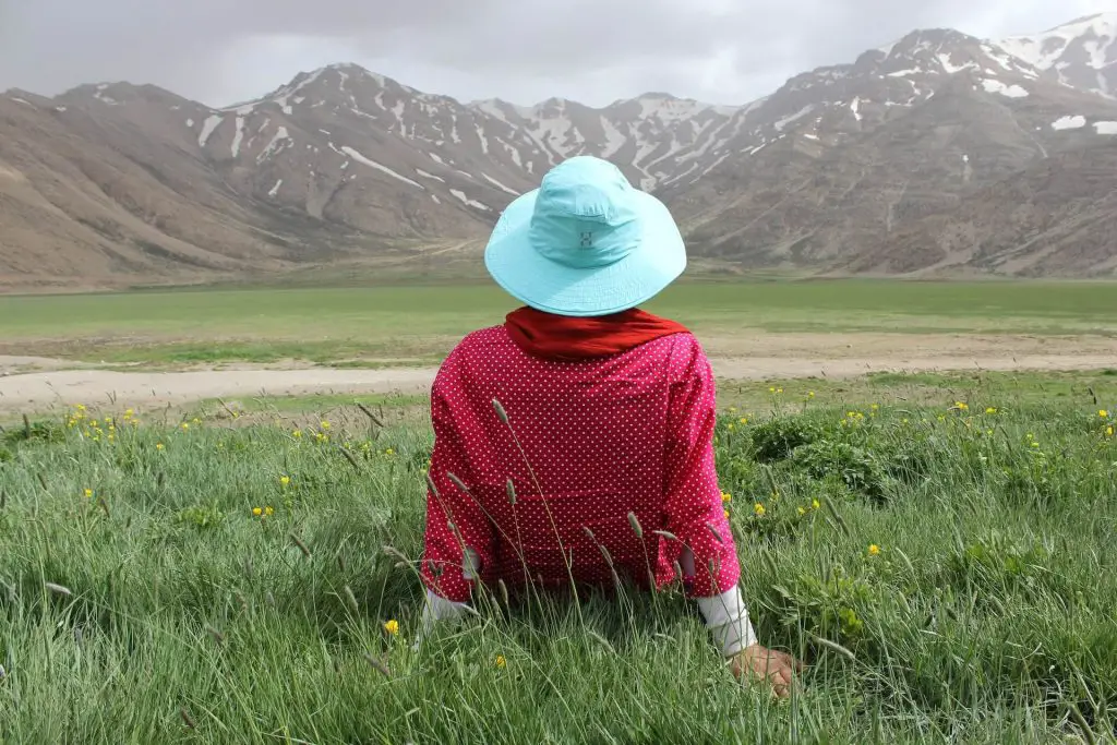 hiker taking a break on the grass